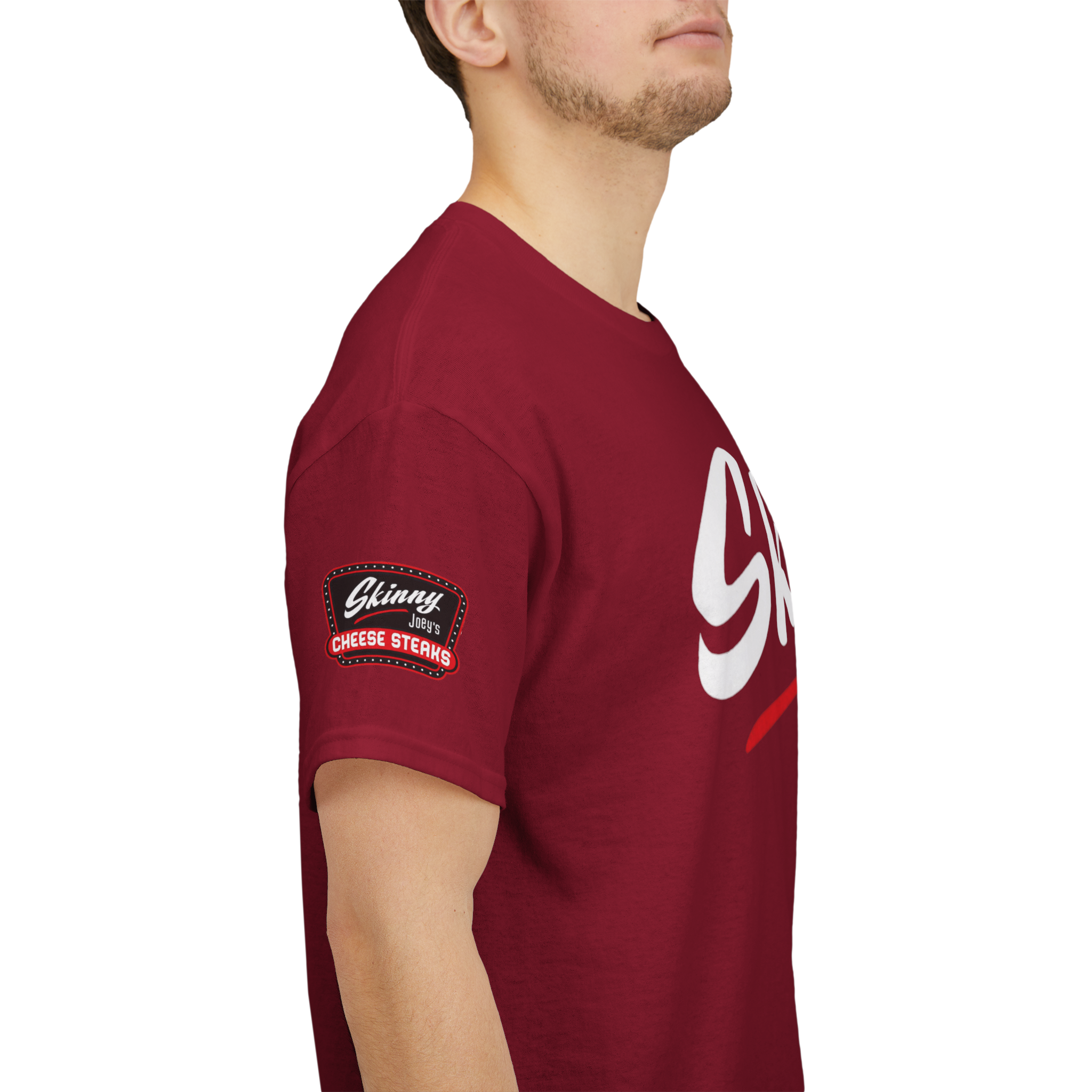 Red t-shirt with a logo on the sleeve worn by a person