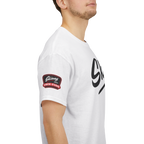 White t-shirt with a logo on the sleeve and text on the chest, worn by a person.