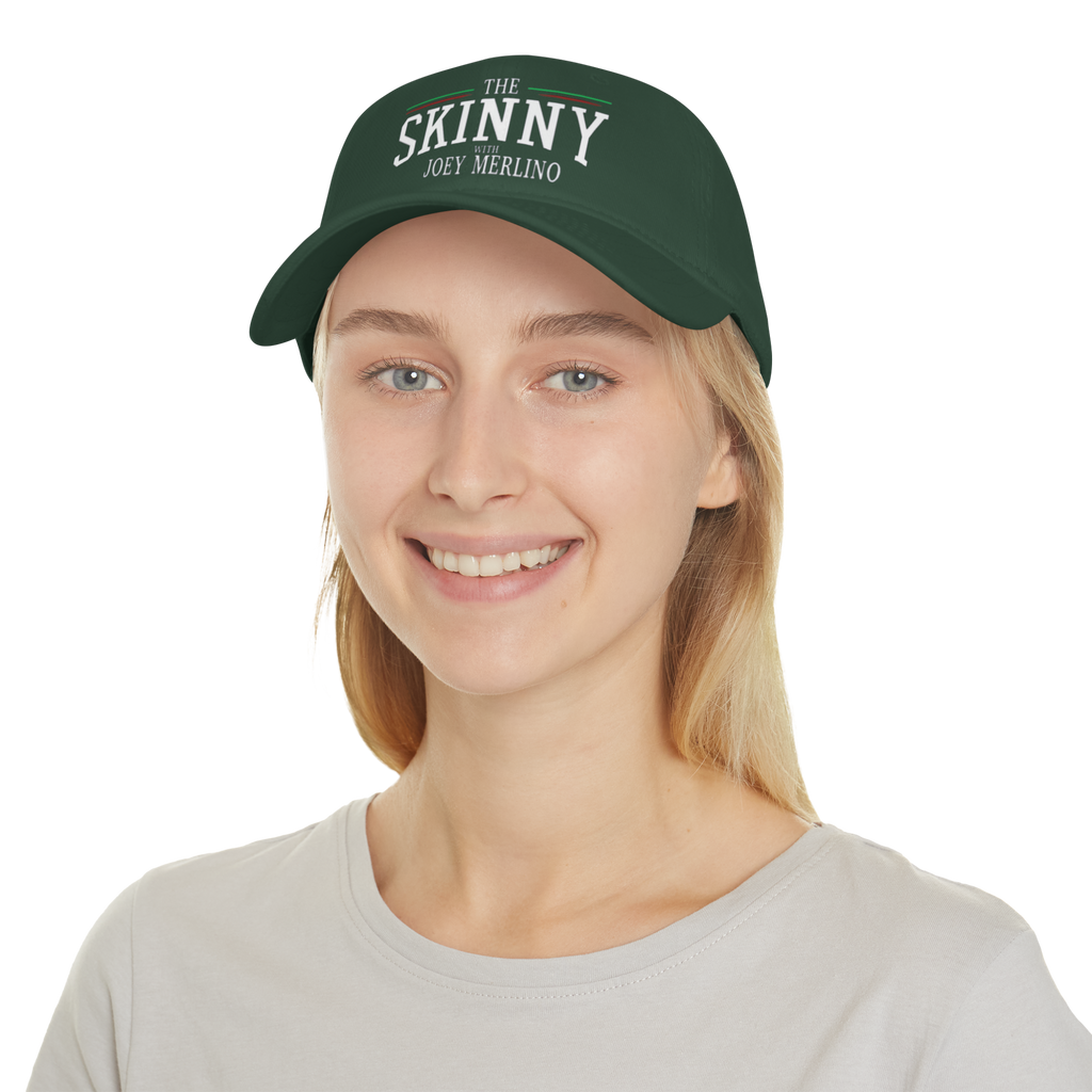 Person wearing a green cap with 'The Skinny' text on a white background