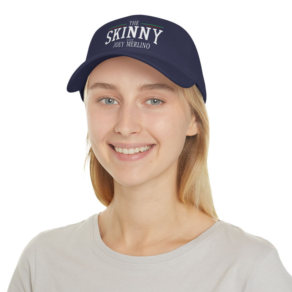 Person wearing a navy blue cap with 'The Skinny' text on a white background