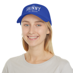 Person wearing a blue cap with 'The Skinny' text on a white background