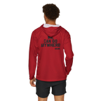 Person wearing a red hoodie with text on the back, standing against a white background