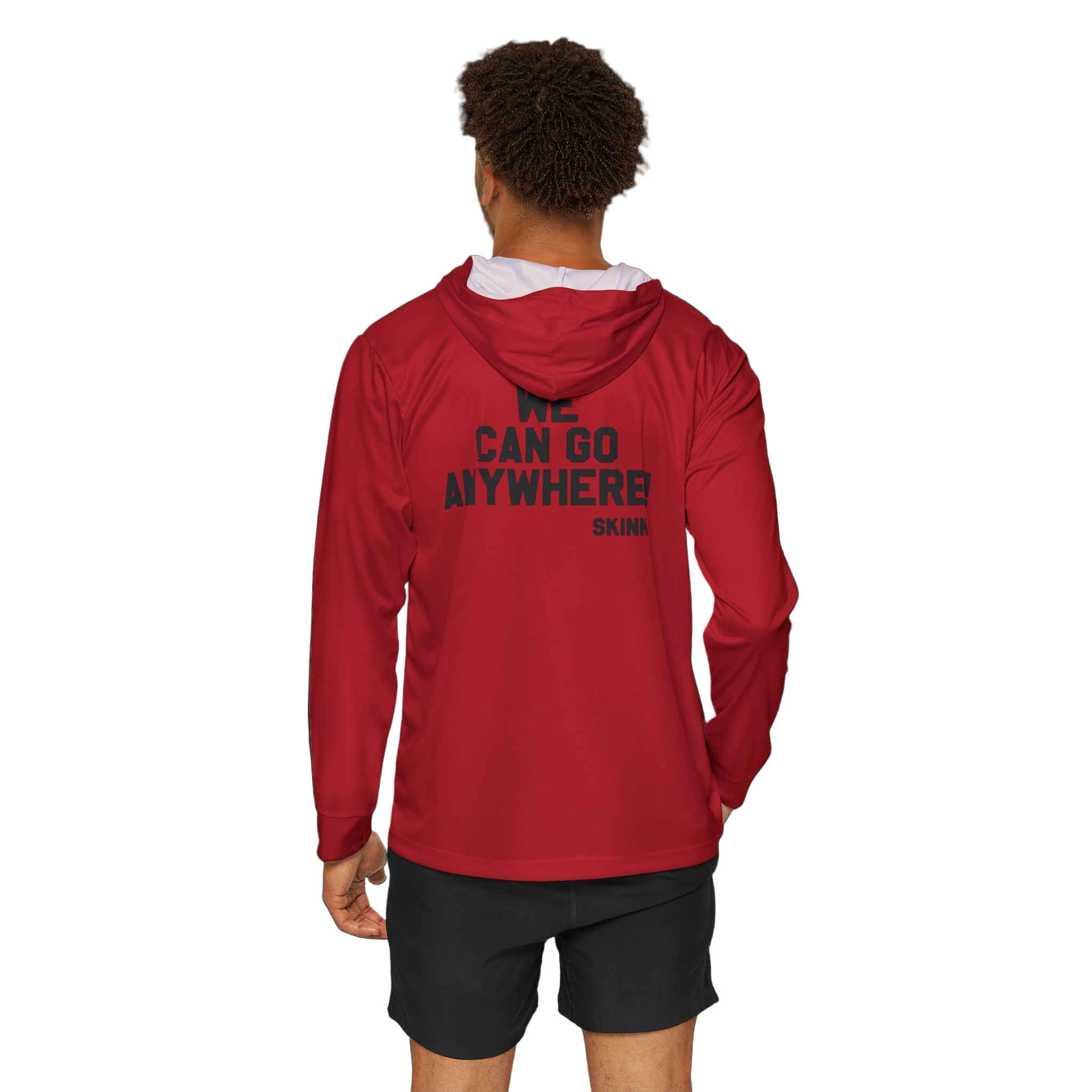 Person wearing a red hoodie with text on the back, standing against a white background