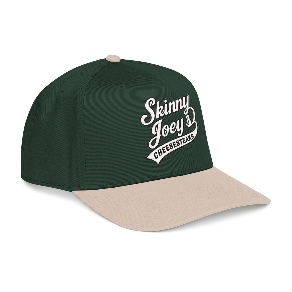Green and beige cap with 'Skinny Joey's Cheesesteaks' text on a white background