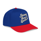 Blue and red cap with 'Skinny Joey's Cheesesteaks' logo on a white background
