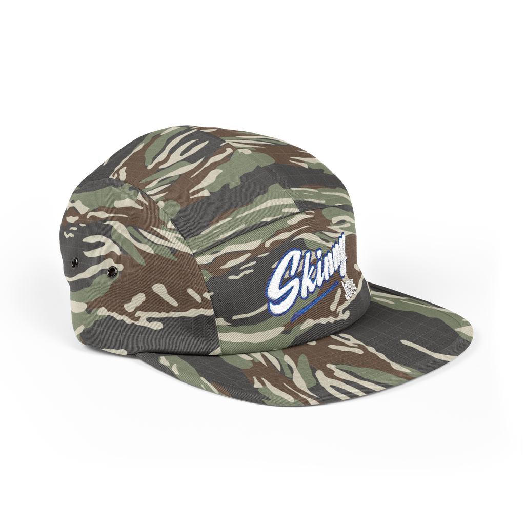 Camouflage cap with a brand logo on a white background